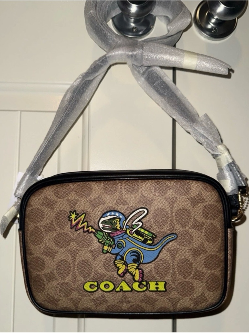 Coach Brown Signature Canvas Crossbody with Colorful Dino Patch